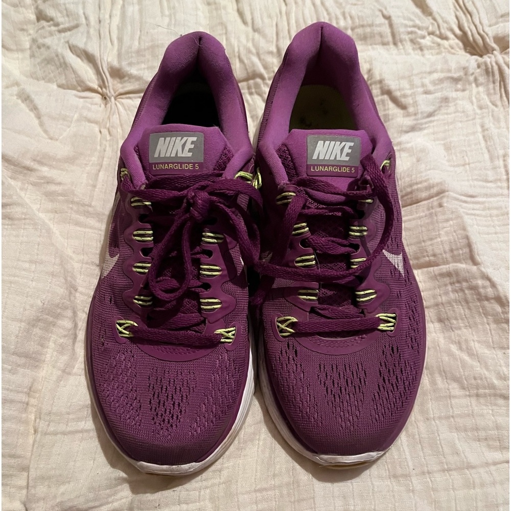 Purple Nikes size 6.5